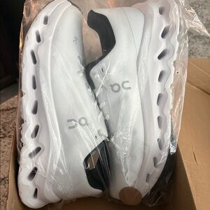 On Running Men's White and Black Athletic Shoes